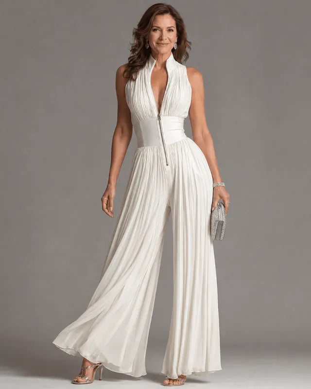 Mono blanco de mujer con cuello plisado, pierna ancha, moderno y sexy.